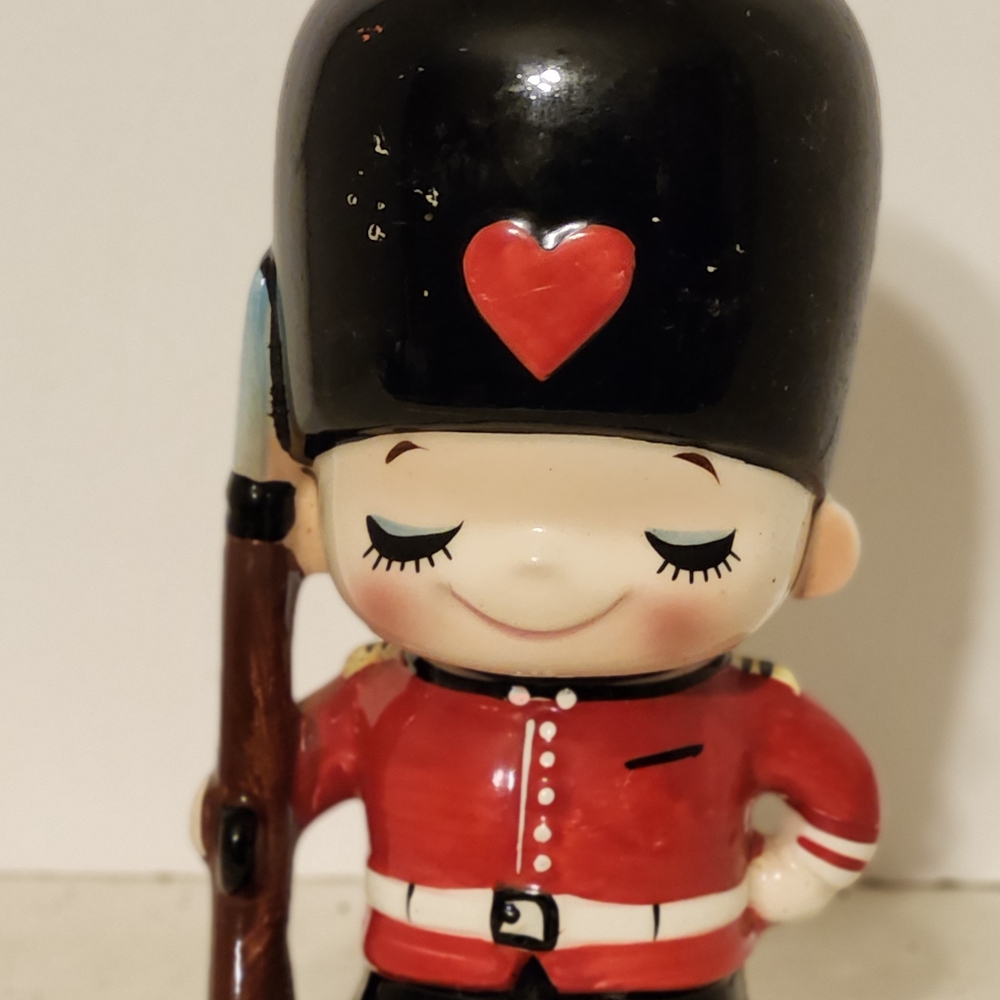 Adorable Royal Guard Figurine with Heart Accent